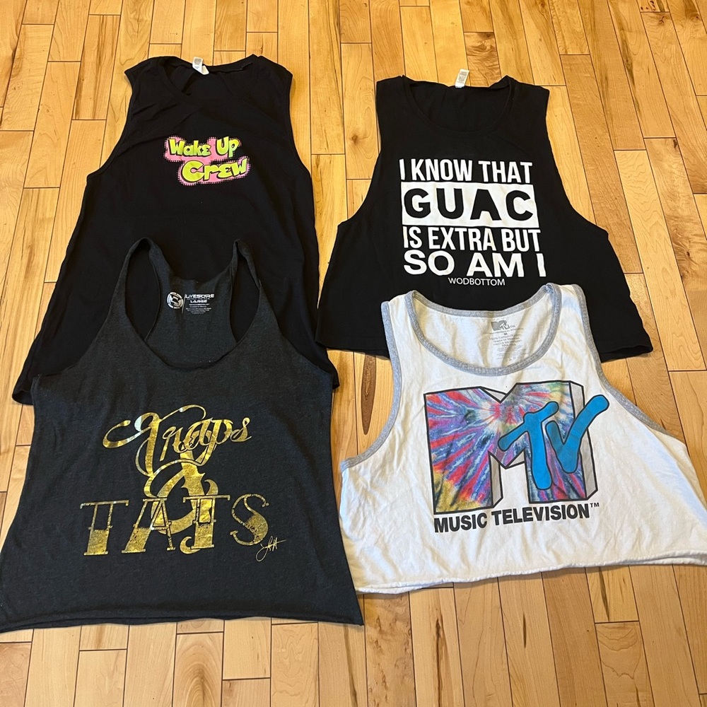 Bundle of 4 Graphic tanks. Size M